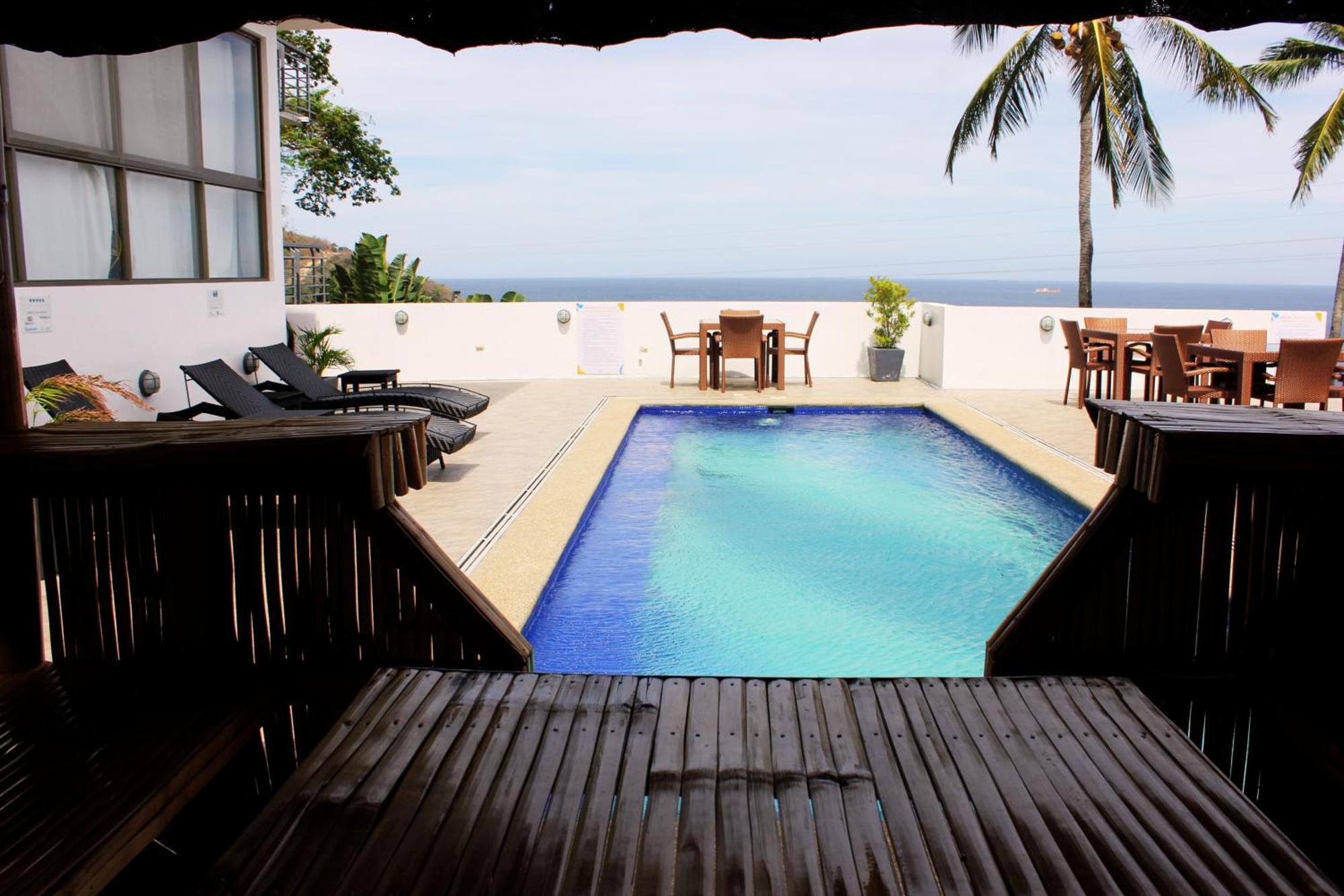 Av Suites Puerto Galera Luaran gambar